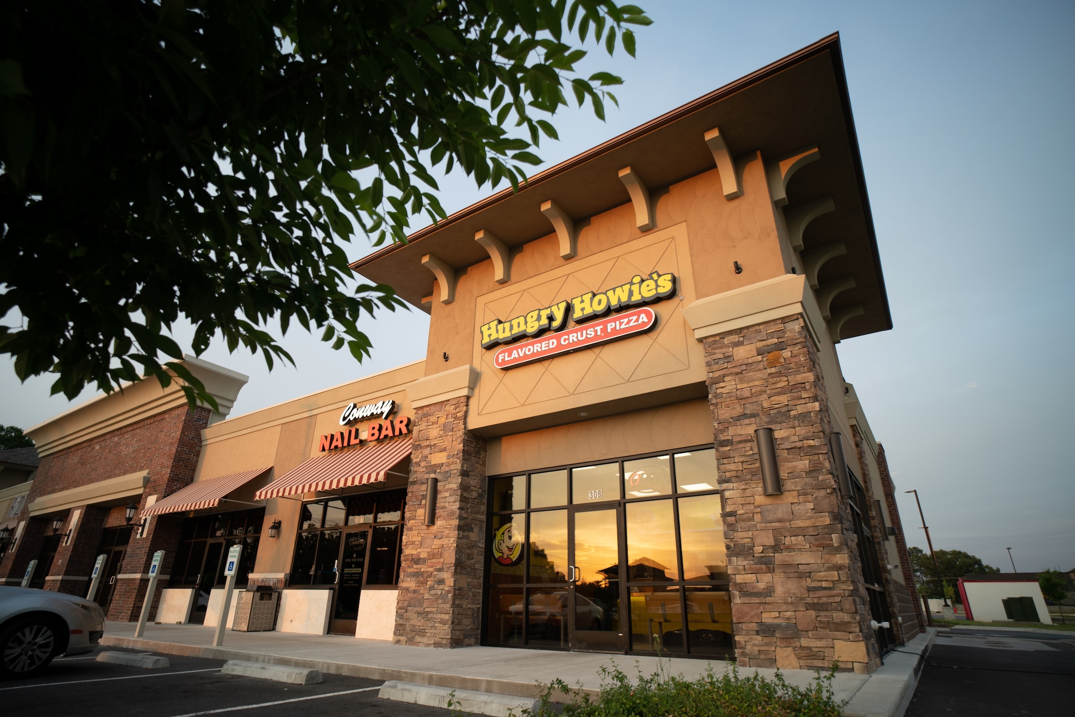 Exterior photo of a hungry howie’s restaurant Exterior photo of a hungry howie's restaurant